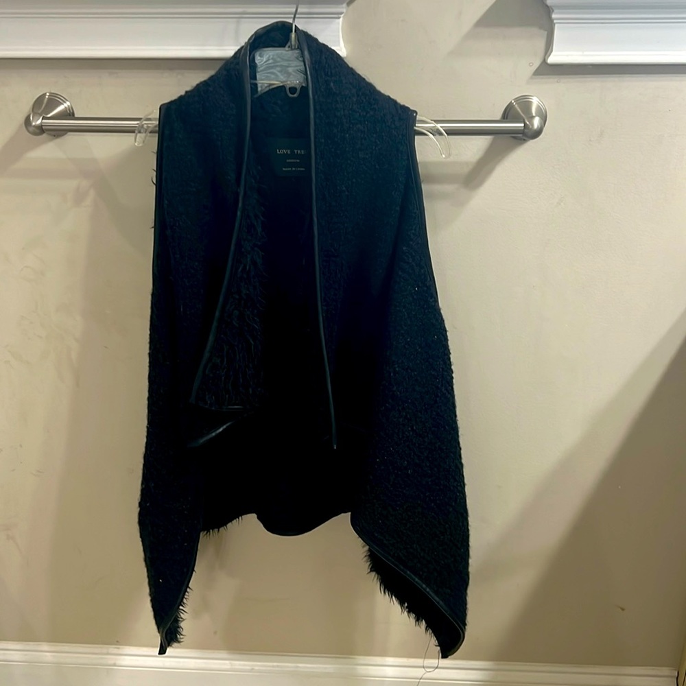 Women’s size Medium. Love Tree brand, lined faux fur vest.